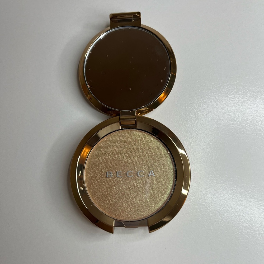 Becca Topaz Flashes Gilt Highlighter